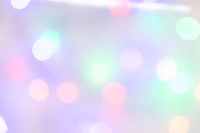 Defocused image of illuminated lights at night
