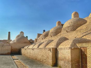 Low angle view of old ruins against sky