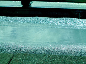 Close-up of water drops on swimming pool