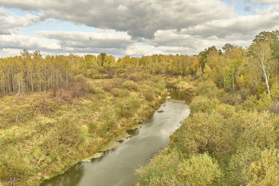 Siberian autumn landscape with taiga river vagai, russia.