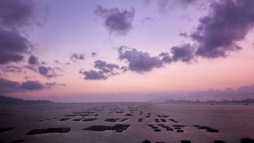 Scenic view of sea at sunset