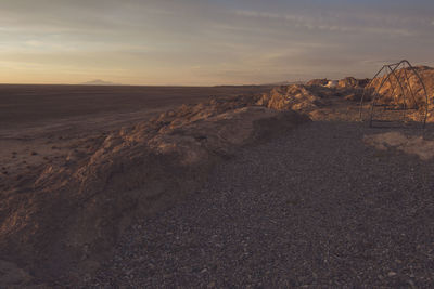 Scenic view of landscape against sky during sunset