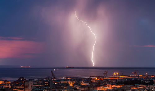 View of lightning over sea at night