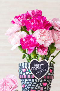 Close-up of pink roses in vase