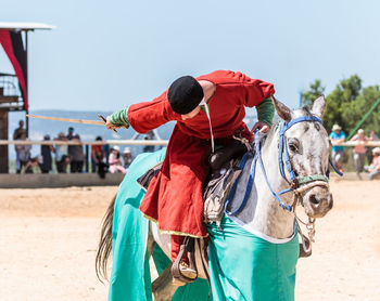 View of horse riding