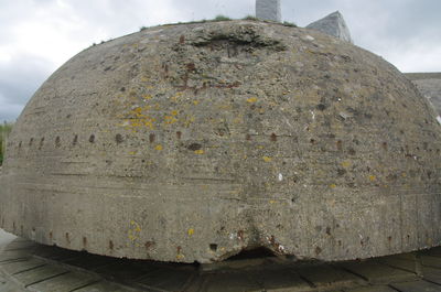 Low angle view of stone wall