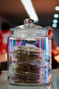 Close-up of water in glass jar on table
