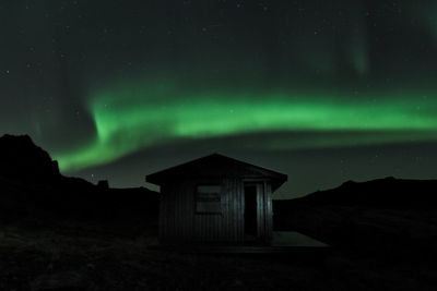 Built structure against sky at night
