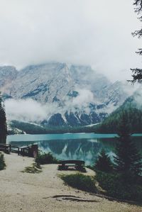 Scenic view of sea and mountains against sky