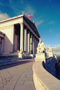 Exterior of parliament building against sky