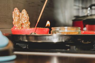 Close-up of fire on table