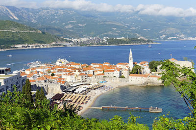 High angle view of town by sea