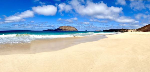 Panoramic view of beach against sky