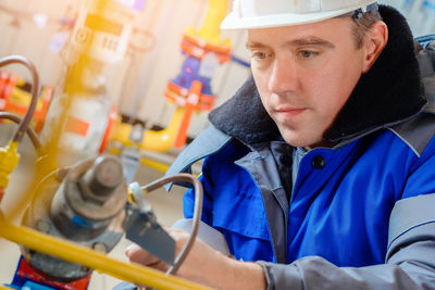 Portrait of man working in workshop