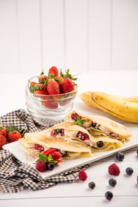 Close-up of fruits served in plate