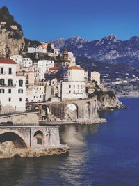 View of townscape by sea