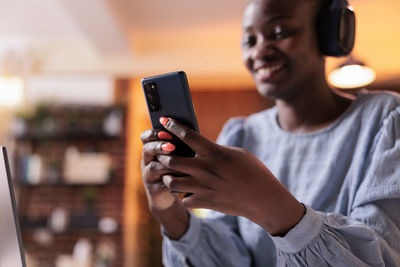 Young man using mobile phone