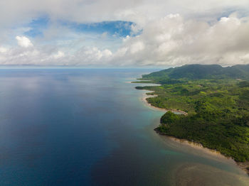 Coast of the island with jungle and coastline. seascape in the tropics. balabac, palawan