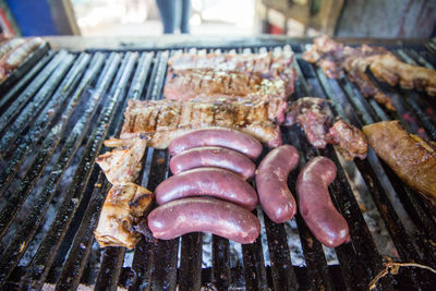 Close-up of meat on barbecue grill