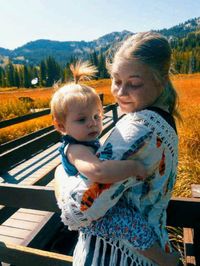 Portrait of mother and daughter outdoors