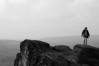 Man standing on rock formation