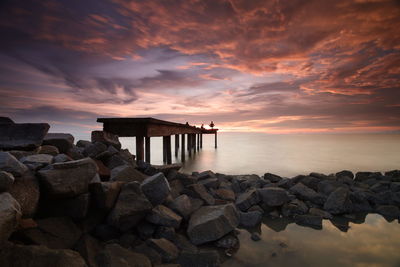 Scenic view of sea against sky during sunset