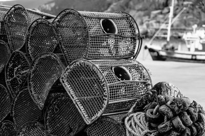 Stacked lobster traps at harbor