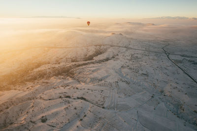 Scenic view of winter landscape during sunset