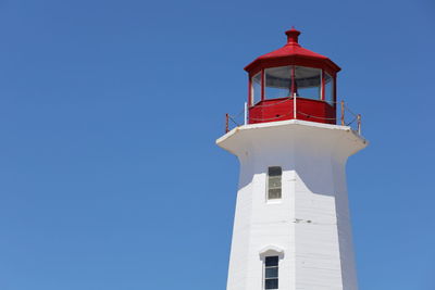 Low angle view of lighthouse against sky