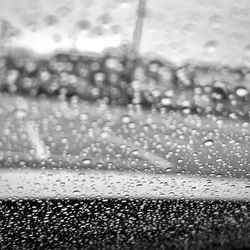 Close-up of wet window in rainy season