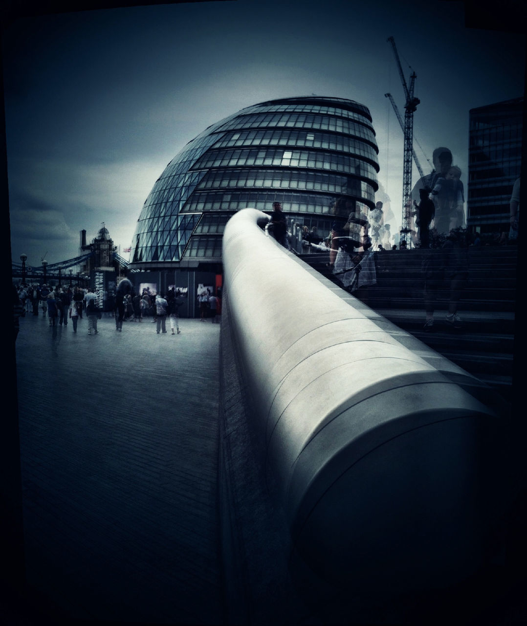 architecture, building exterior, built structure, transfer print, auto post production filter, city, sky, transportation, modern, travel, low angle view, city life, tower, illuminated, travel destinations, incidental people, outdoors, capital cities, skyscraper, street