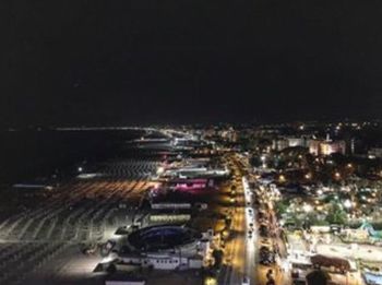 Illuminated cityscape at night