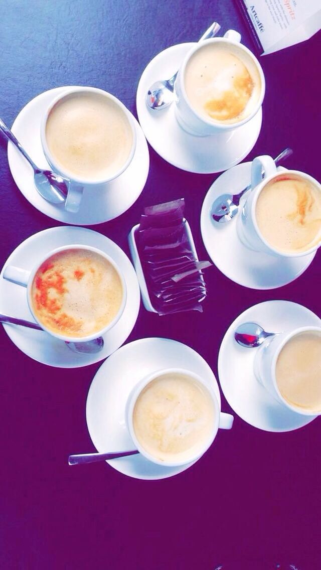 CLOSE-UP OF COFFEE CUP ON TABLE