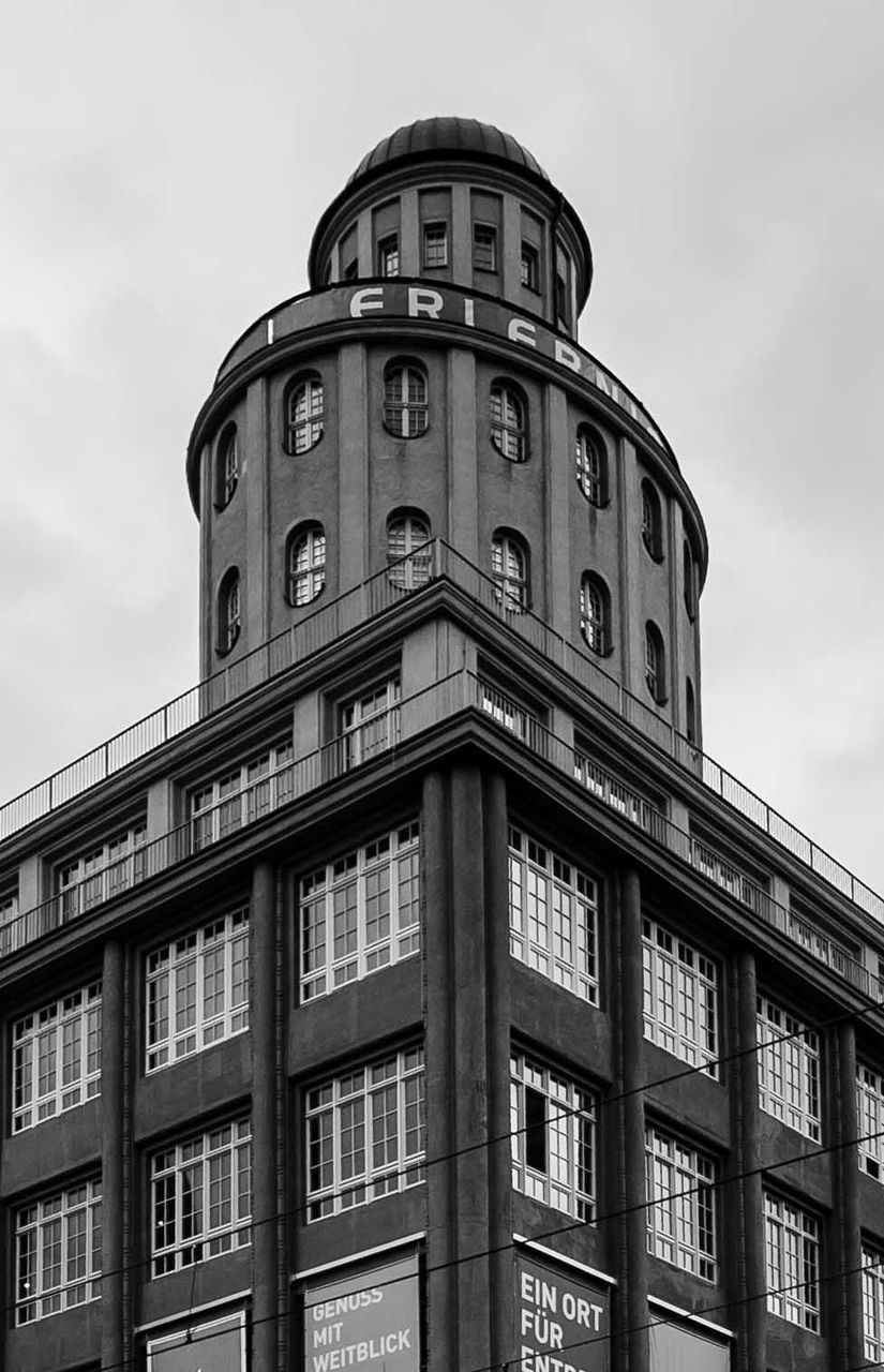 architecture, built structure, building exterior, low angle view, sky, window, building, city, facade, day, architectural feature, outdoors, modern, no people, tower, glass - material, cloud - sky, cloud, tall - high, travel destinations