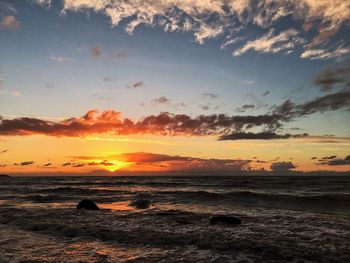 Scenic view of sea against sky during sunset