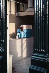 View through the door into a cafe with focus on the coffee machine and no people