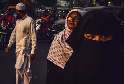 People walking on city street