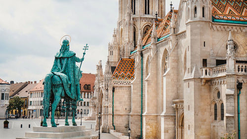 Statue of historic building in city