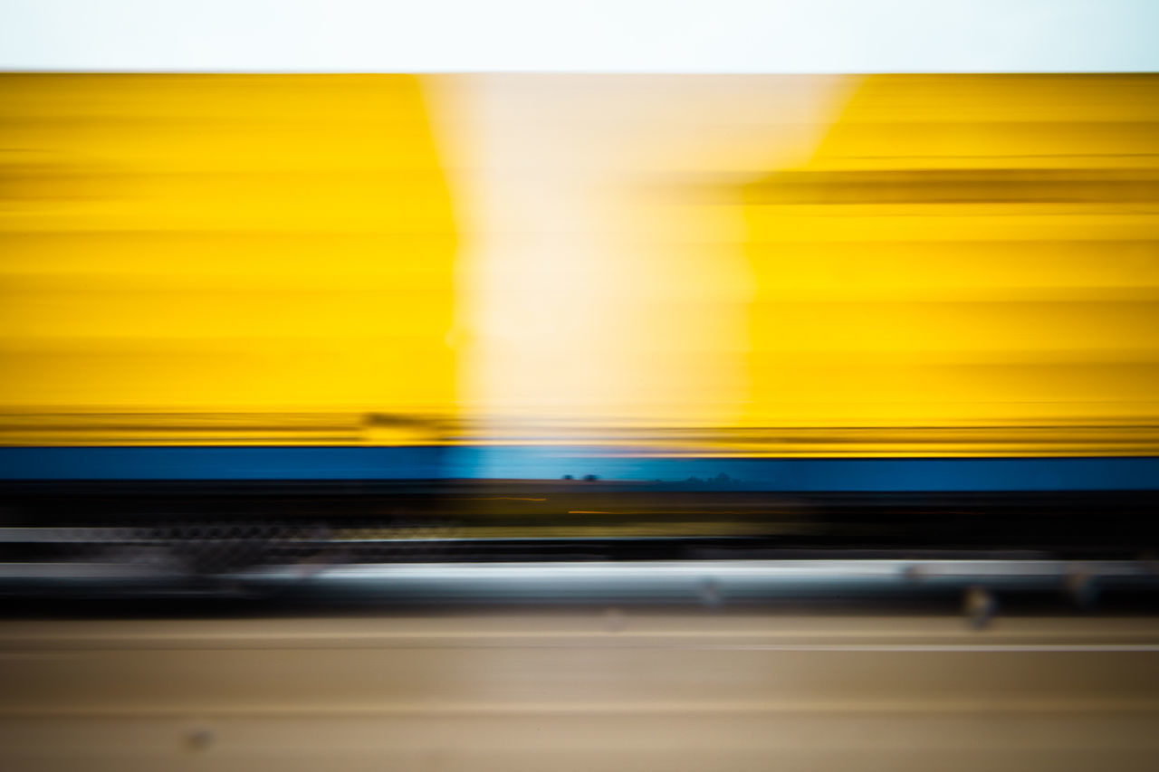 BLURRED MOTION OF TRAIN AT CITY