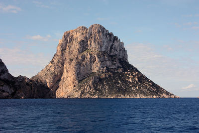 Close up of magical island es vedra between blue sea and azure sky in ibiza in balearic island