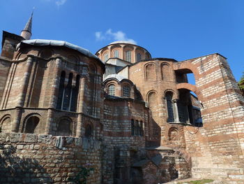 Low angle view of old building against sky