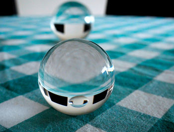 High angle view of crystal ball on table