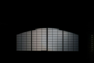 Close-up of window in dark room