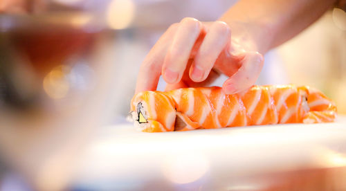 Close-up of hand holding food