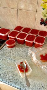 High angle view of fruits in container on floor