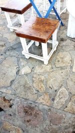 High angle view of chairs on table