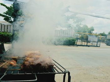 Panoramic view of meat on barbecue grill