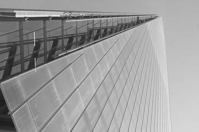 Low angle view of bridge against sky in city