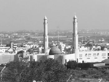 Cityscape against clear sky