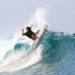 Man surfing in sea